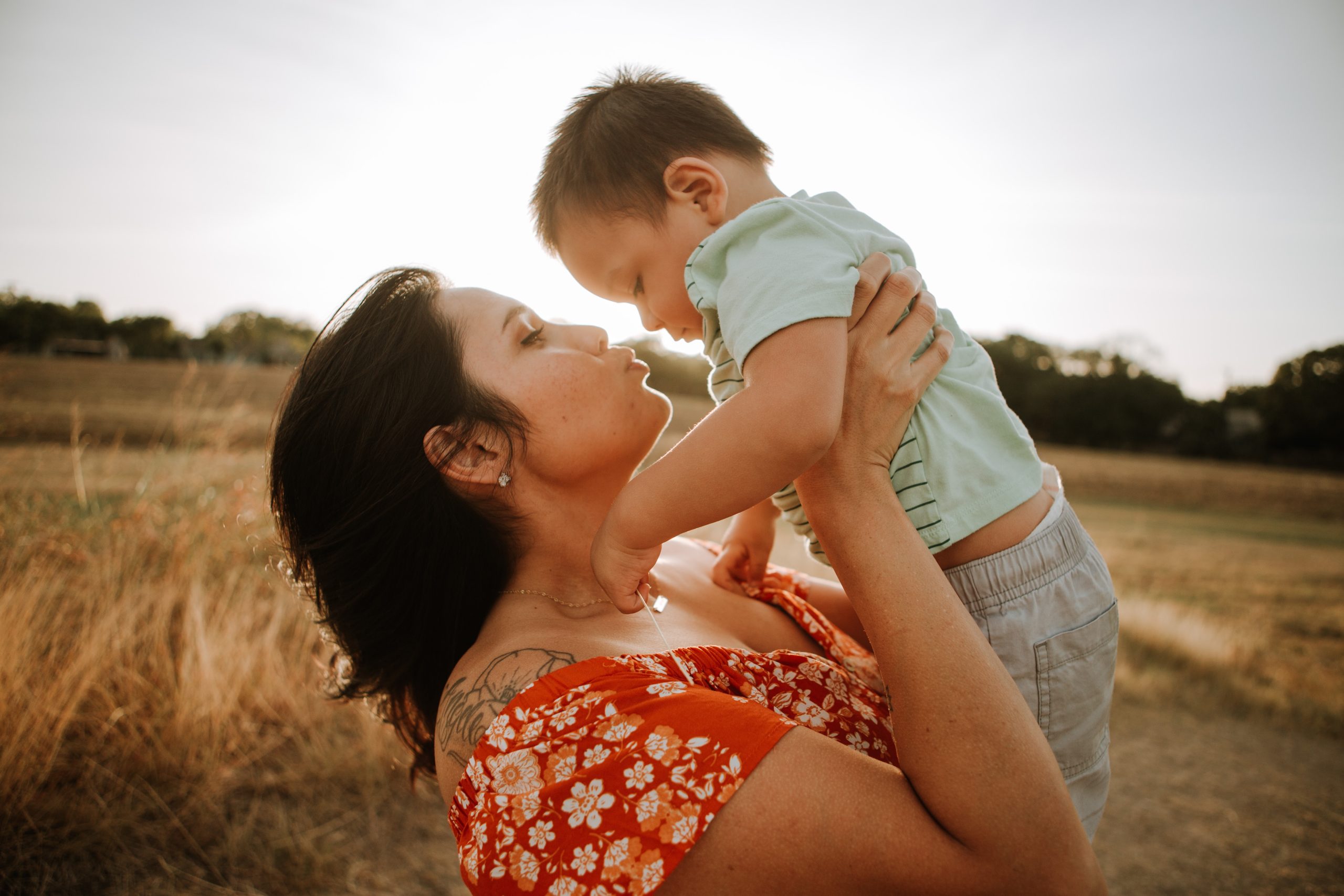 Caregiver and children in a playful setting, exemplifying best practices in home-based childcare in Auckland.